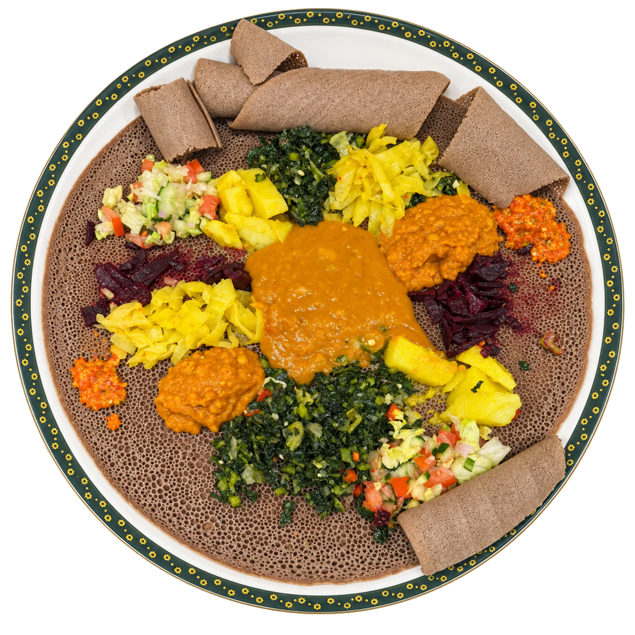 Vegetarian platter of injera with orange stews, greens, potatoes, cabbage, beetroot and chopped salad